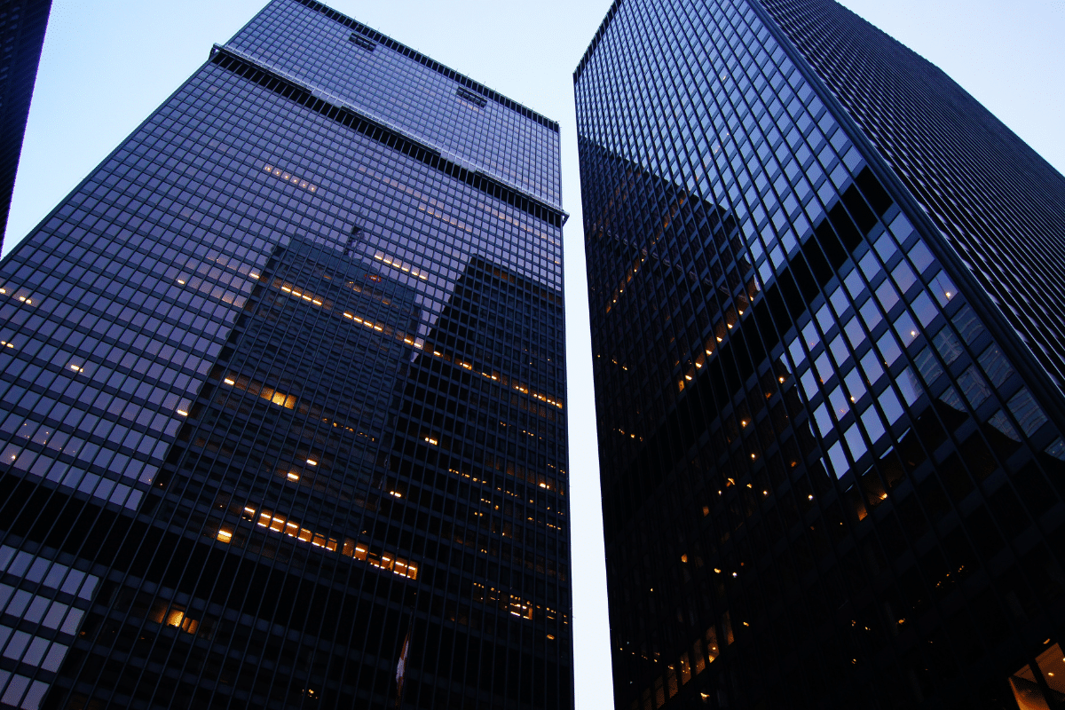 Two skyscrapers at dusk.